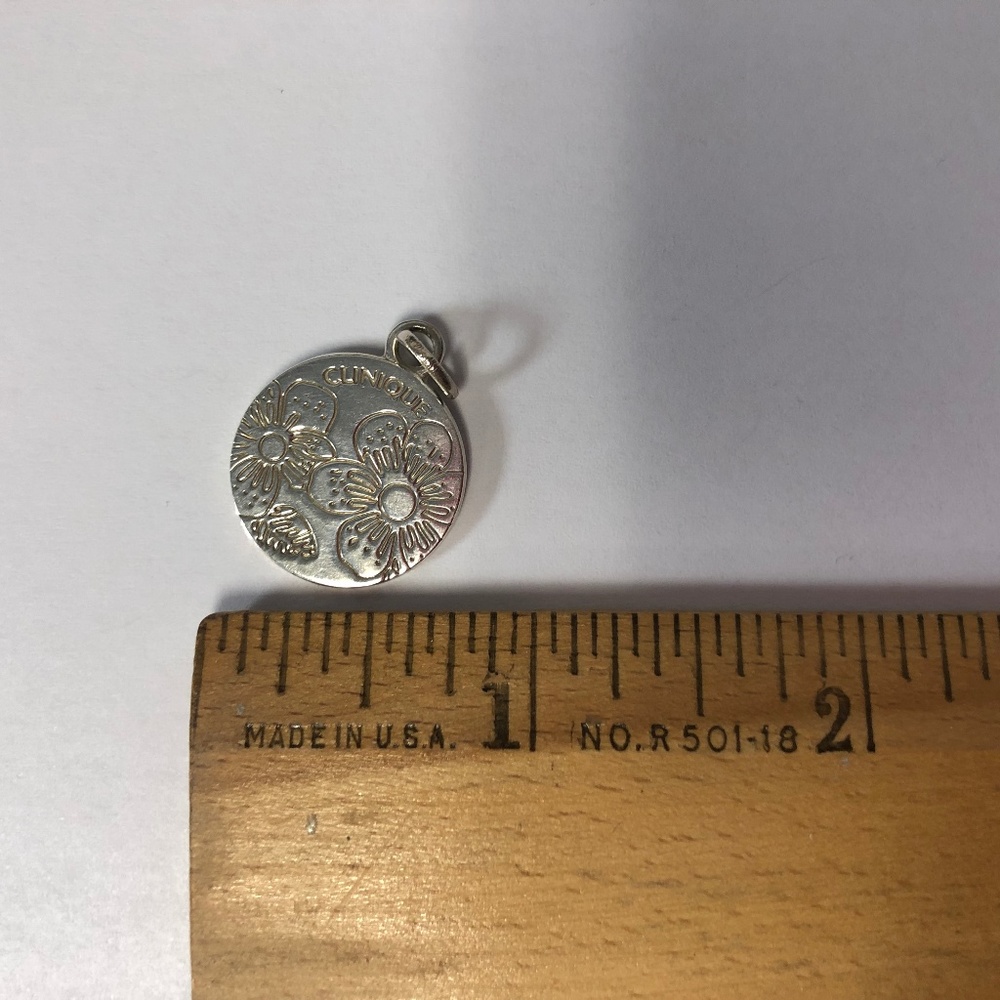 Tiffany Clinique flower pendant